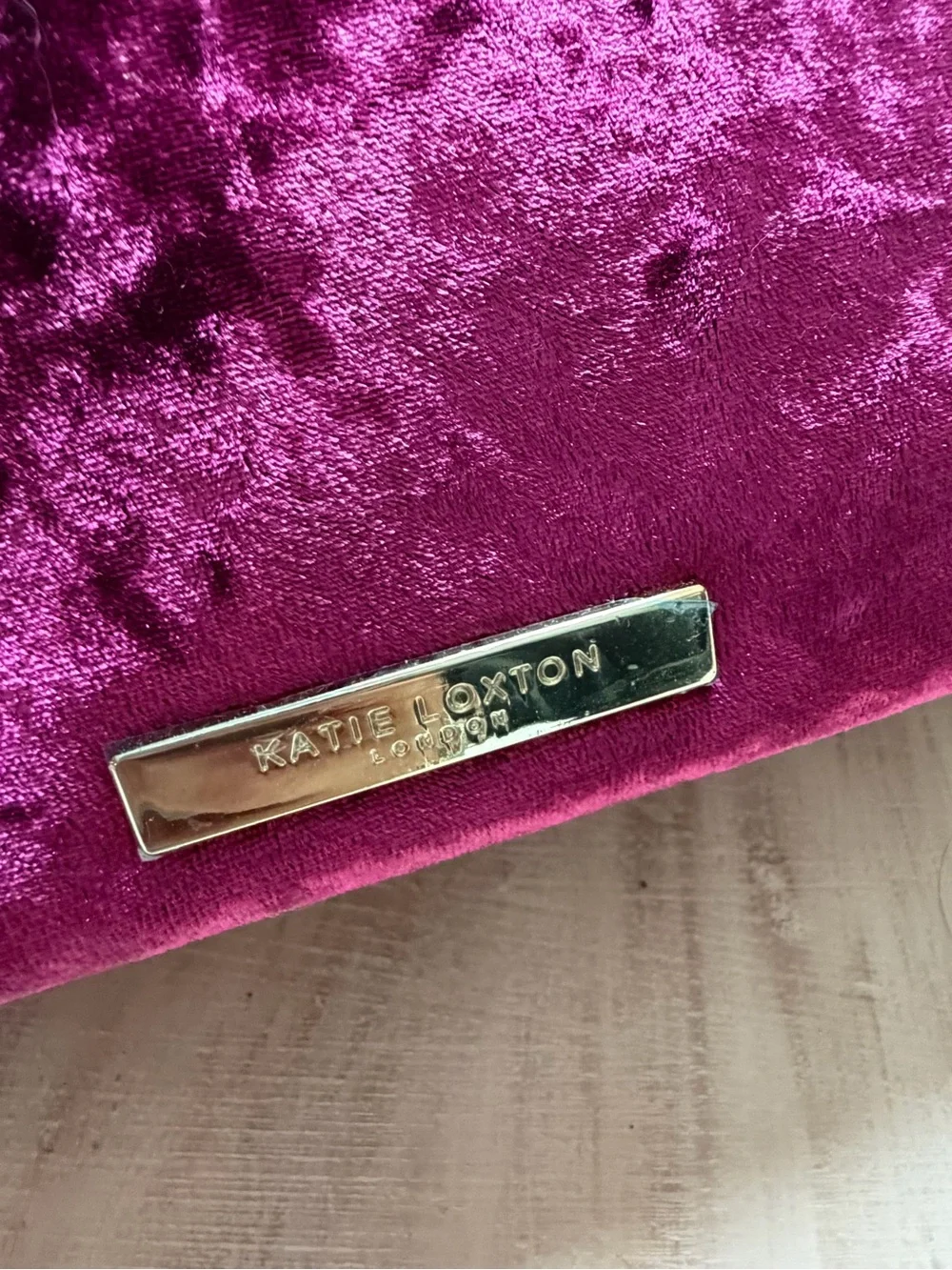 Katie Loxton magenta crushed velvet pouch bag